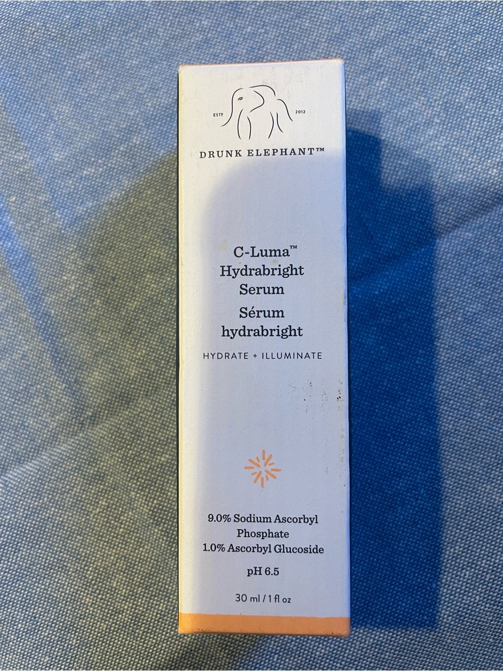 Drunk Elephant C-Luma Hydrabrigh Serum White with Orange Accents